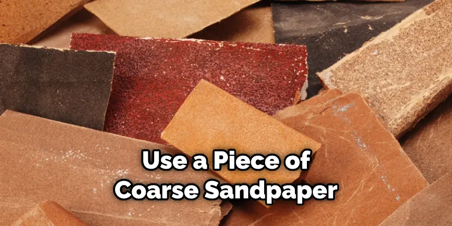 Use a Piece of Coarse Sandpaper